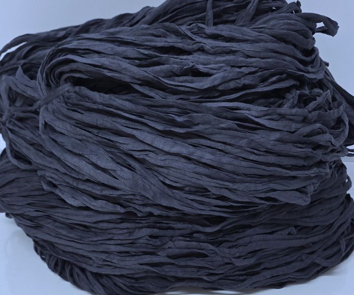 Tummanharmaa trikookude