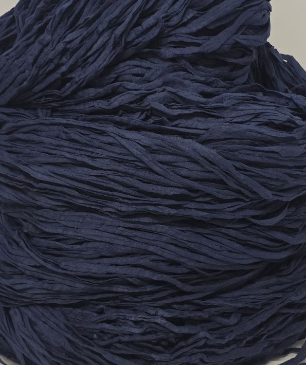 Tummansininen trikookude