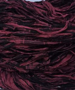 Kirjava viininpunainen trikookude