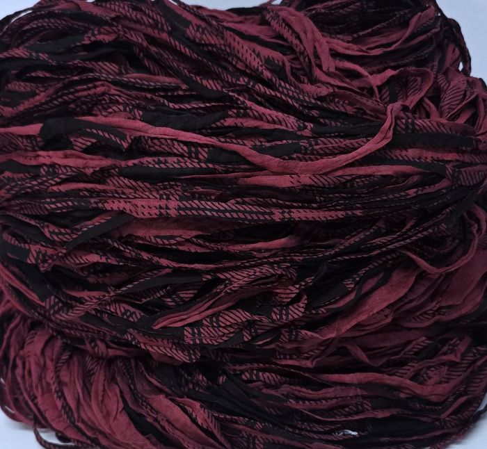 Kirjava viininpunainen trikookude