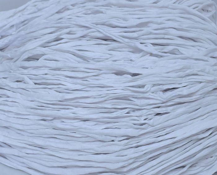 Vitivalkoinen trikookude